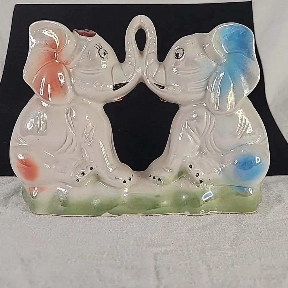 Unbranded elephants kissing